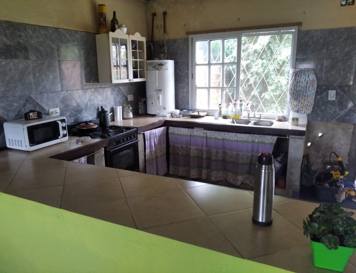 CASA CON TERRENO