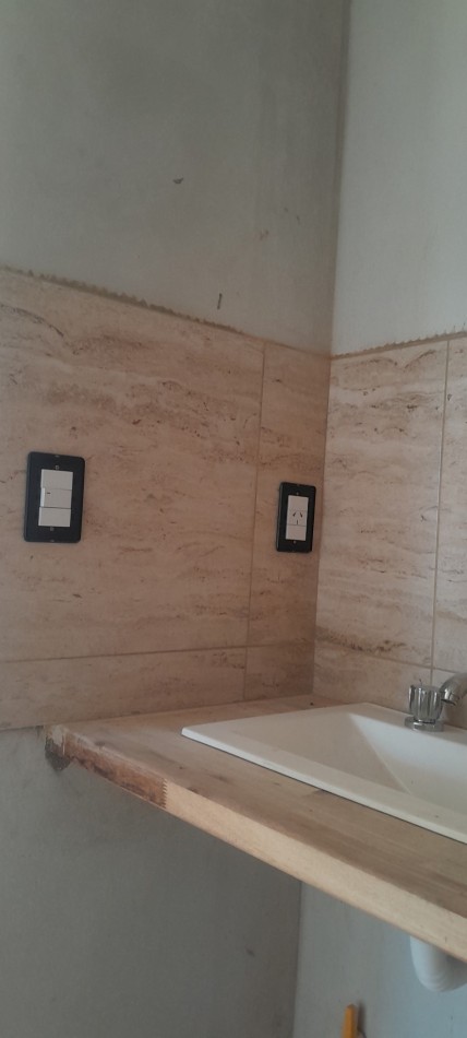 A Estrenar!!  Dpto 2 Ambientes en Zona Comercial.Con Patio, Parrilla, y Cochera - Ideal Turismo-.