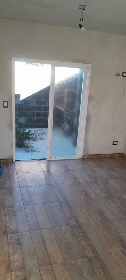 A Estrenar!!  Dpto 2 Ambientes en Zona Comercial.Con Patio, Parrilla, y Cochera - Ideal Turismo-.