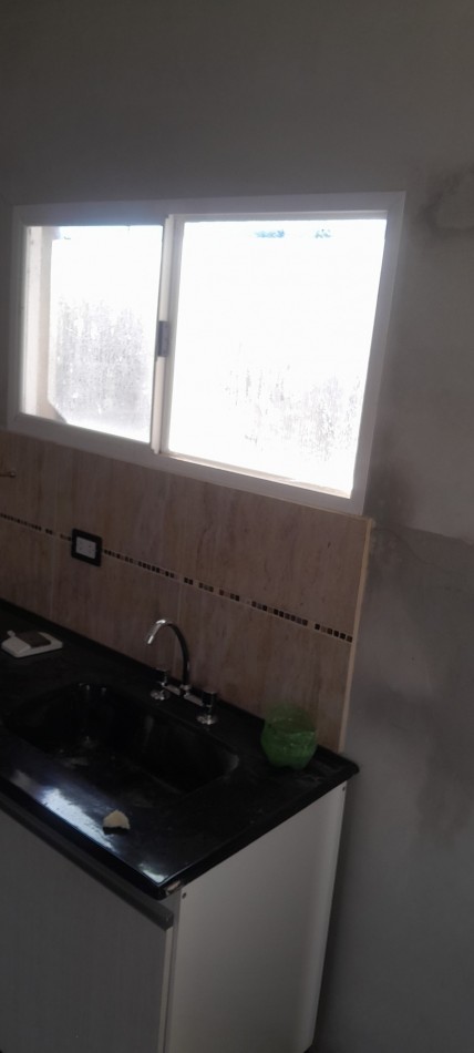 A Estrenar!!  Dpto 2 Ambientes en Zona Comercial.Con Patio, Parrilla, y Cochera - Ideal Turismo-.